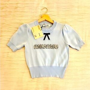 Miu Miu Blue Sweater with Bow Detail. Fits Small/Medium